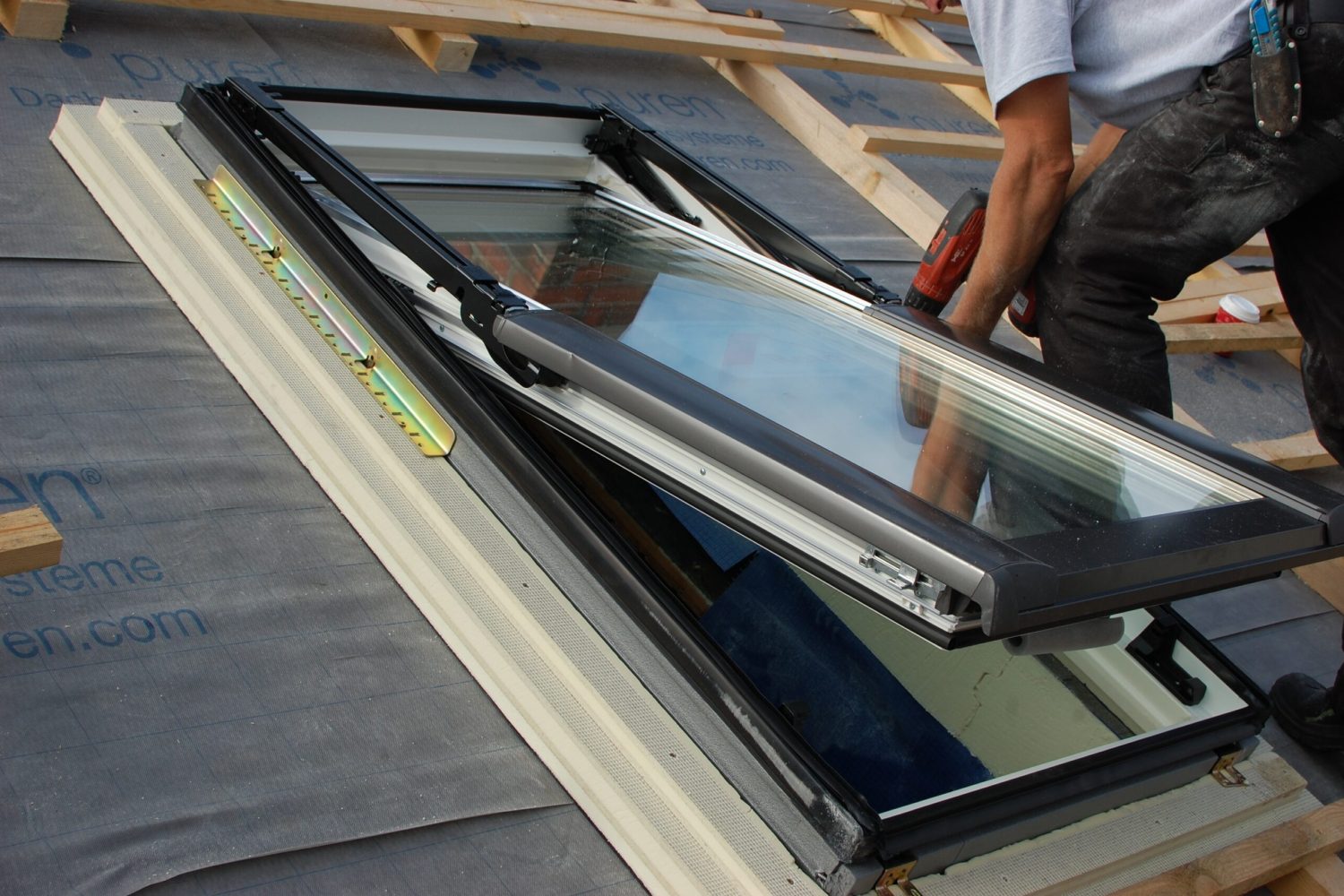 assembling-fitting-a-roof-window-skylight-with-2023-11-27-05-07-57-utc-5-scaled.jpg