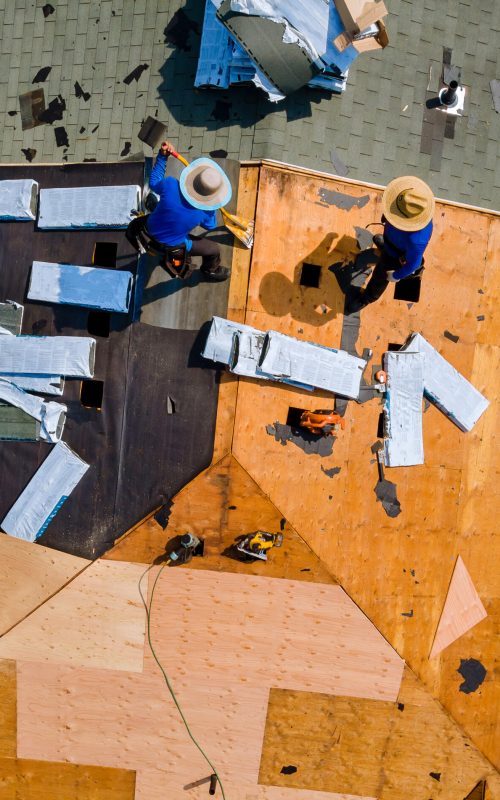 construction-roofer-installing-roof-tiles-at-house-2024-07-25-18-51-39-utc-1-scaled.jpg