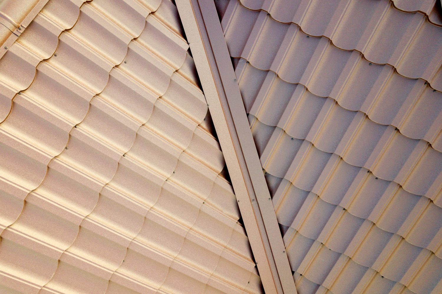 house-roof-surface-covered-with-brown-metal-tile-s-2023-11-27-05-13-57-utc-scaled.jpg