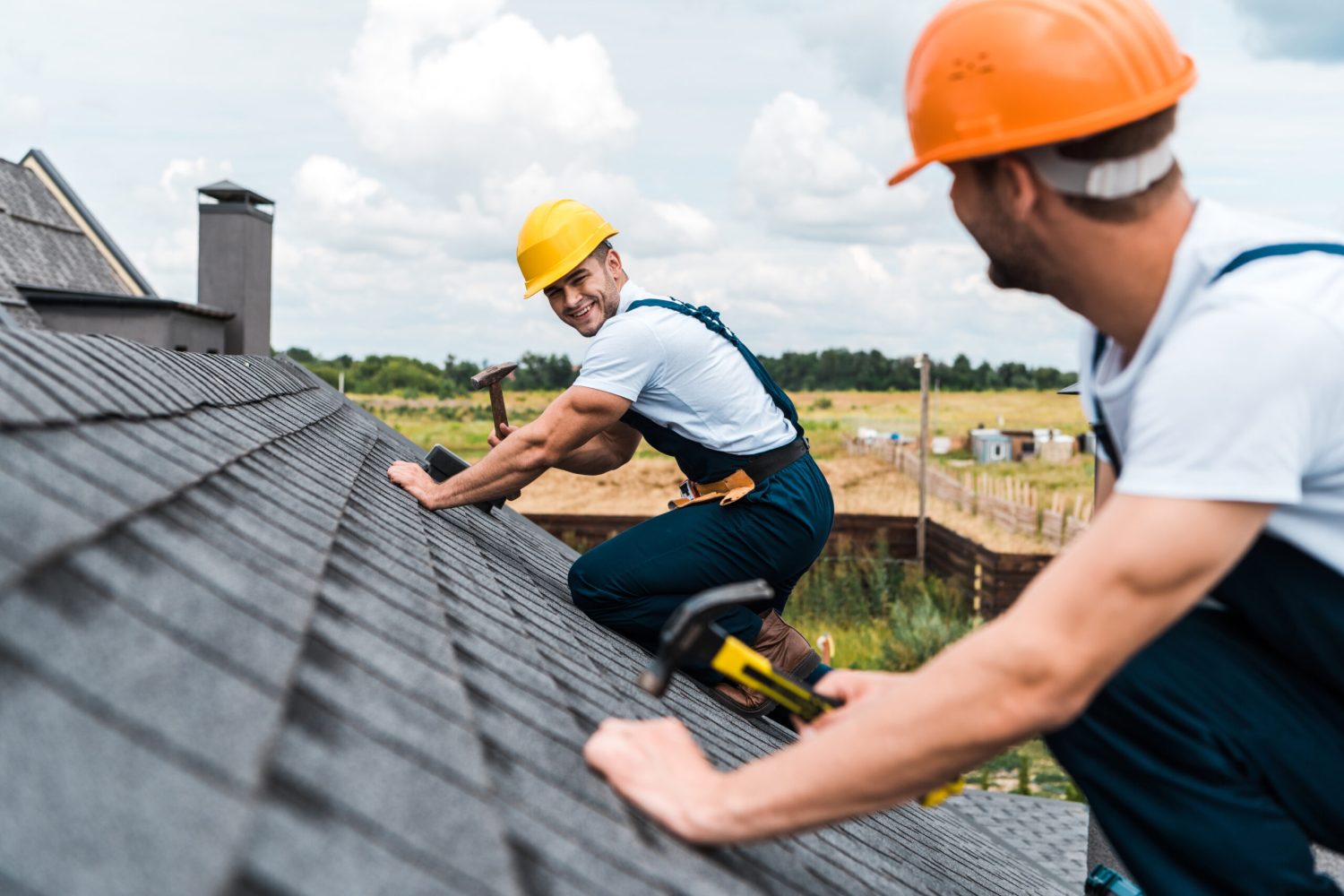 selective-focus-of-happy-repairman-looking-at-cowo-2023-11-27-05-17-48-utc-scaled.jpg